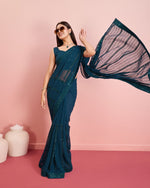 Beauteous Teal Color Georgette Fabric Partywear Saree