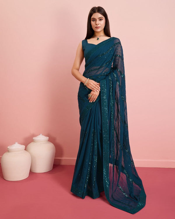 Beauteous Teal Color Georgette Fabric Partywear Saree