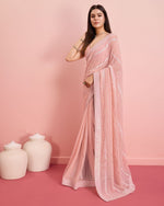 Beauteous Peach Color Georgette Fabric Partywear Saree