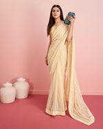 Beauteous Cream Color Georgette Fabric Partywear Saree