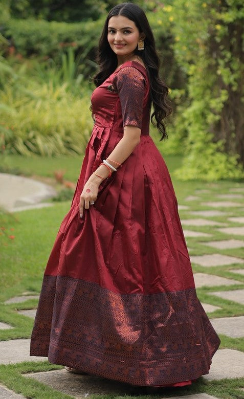 Dazzling Maroon Color Banarasi Fabric Gown