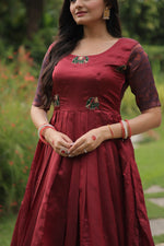 Dazzling Maroon Color Banarasi Fabric Gown