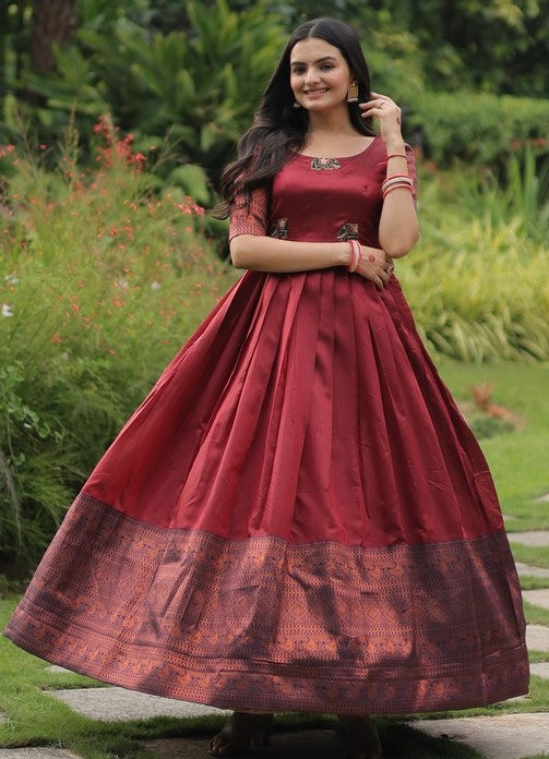 Dazzling Maroon Color Banarasi Fabric Gown