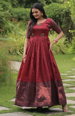 Dazzling Maroon Color Banarasi Fabric Gown