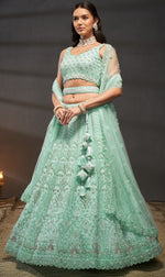 Superb Turquoise Color Net Fabric Party Wear Lehenga