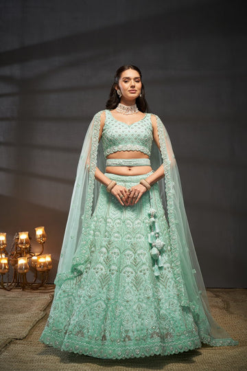 Superb Turquoise Color Net Fabric Party Wear Lehenga