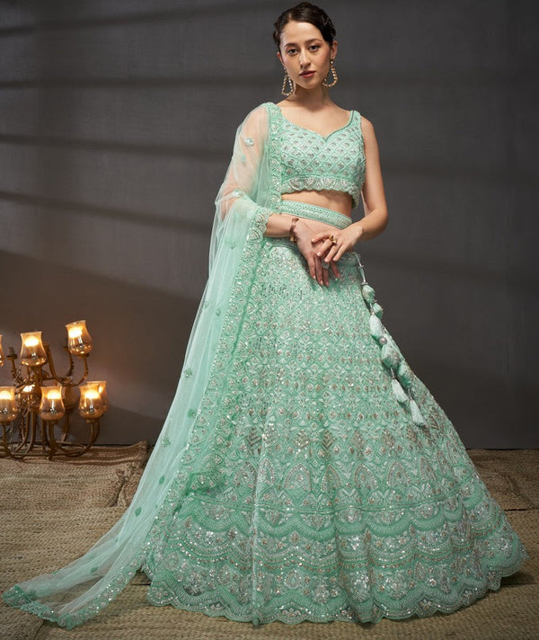 Magnetic Turquoise Color Net Fabric Party Wear Lehenga