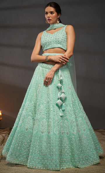 Magnetic Turquoise Color Net Fabric Party Wear Lehenga