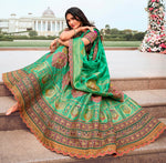 Magnetic Green Color Banarasi Fabric Party Wear Lehenga