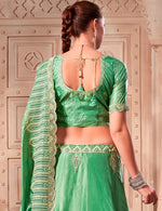 Magnetic Green Color Silk Fabric Party Wear Lehenga