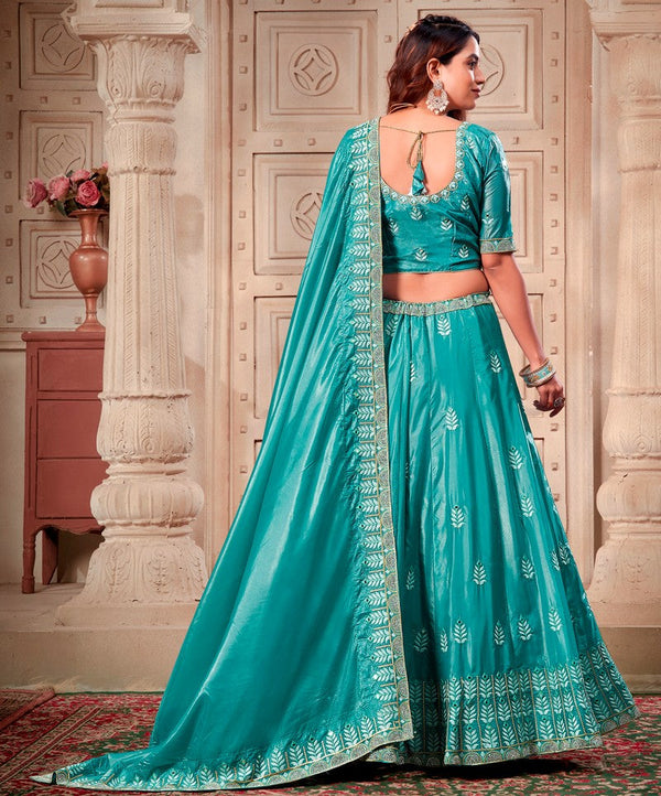 Magnetic Aqua Color Silk Fabric Party Wear Lehenga