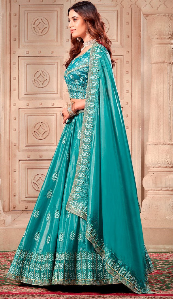 Magnetic Aqua Color Silk Fabric Party Wear Lehenga