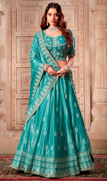 Magnetic Aqua Color Silk Fabric Party Wear Lehenga