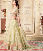 Magnetic Yellow Color Net Fabric Party Wear Lehenga