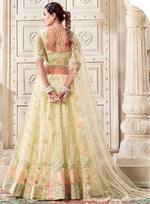 Magnetic Yellow Color Net Fabric Party Wear Lehenga