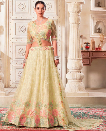 Magnetic Yellow Color Net Fabric Party Wear Lehenga