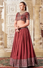 Magnetic Brown Color Rangoli Silk Fabric Party Wear Lehenga