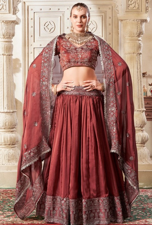 Magnetic Brown Color Rangoli Silk Fabric Party Wear Lehenga