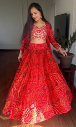 Beautiful Red Color Bandhej Fabric Party Wear Lehenga