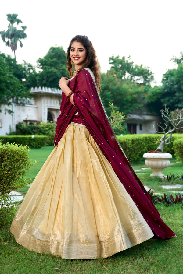 Lovely Cream Color Kanchipuram Fabric Party Wear Lehenga