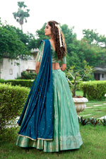 Lovely Green Color Kanchipuram Fabric Party Wear Lehenga