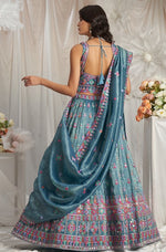 Lovely Teal Color Organza Fabric Party Wear Lehenga