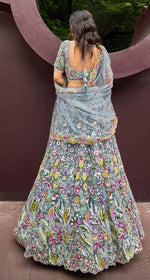 Lovely Aqua Color Net Fabric Party Wear Lehenga