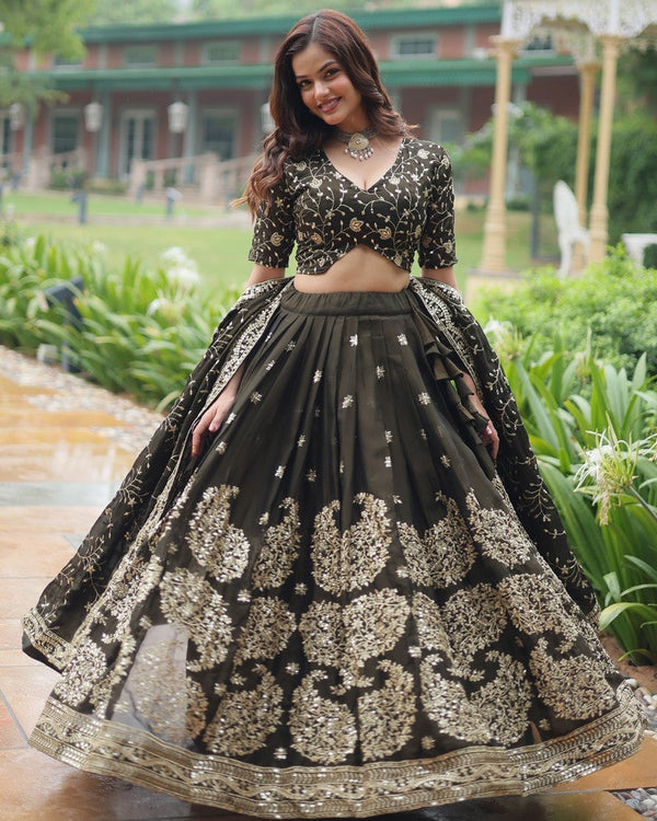 Magnetic Black Color Rangoli Fabric Party Wear Lehenga