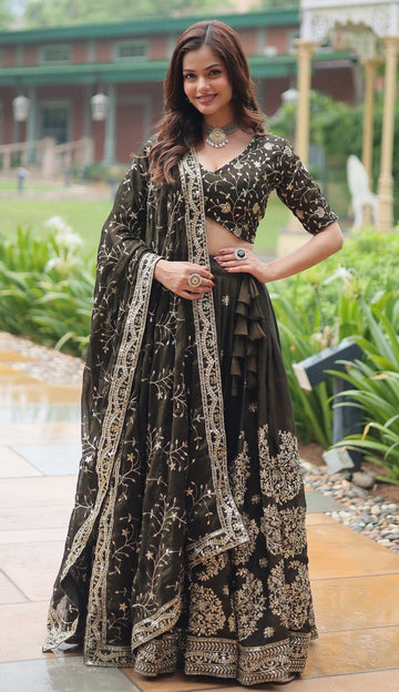 Magnetic Black Color Rangoli Fabric Party Wear Lehenga