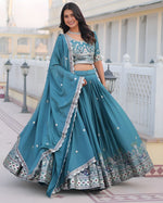 Dazzling Turquoise Color Chinon Fabric Party Wear Lehenga