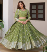 Magnetic Green Color Georgette Fabric Party Wear Lehenga