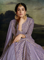 Tasteful Purple Color Net Fabric Designer Suit