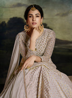 Tasteful Cream Color Net Fabric Designer Suit