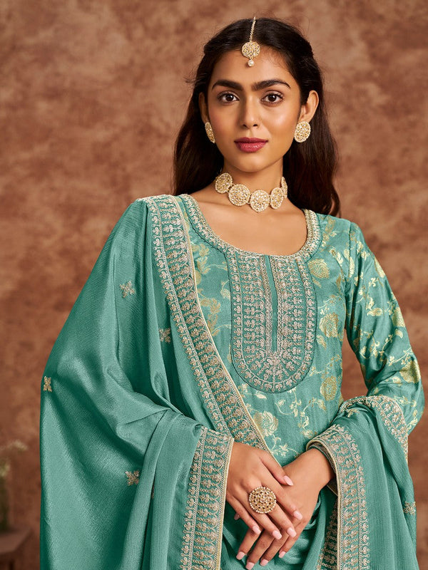 Tasteful Turquoise Color Silk Fabric Designer Suit