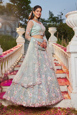 Dazzling Aqua Color Net Fabric Wedding Lehenga