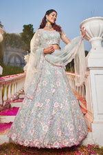 Dazzling Aqua Color Net Fabric Wedding Lehenga