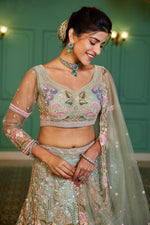 Dazzling Green Color Net Fabric Wedding Lehenga