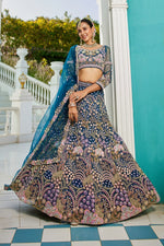 Dazzling Teal Color Net Fabric Wedding Lehenga