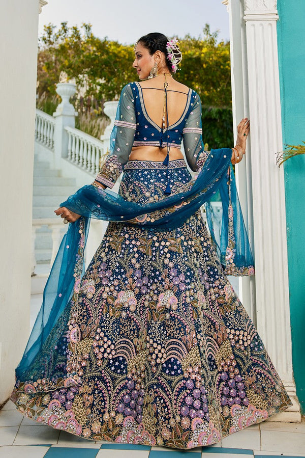 Dazzling Teal Color Net Fabric Wedding Lehenga