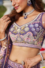 Dazzling Purple Color Net Fabric Wedding Lehenga