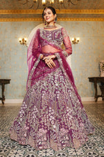 Dazzling Wine Color Net Fabric Wedding Lehenga