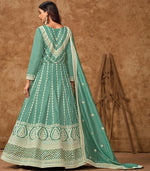 Tasteful Aqua Color Silk Fabric Gown