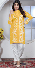 Amazing Yellow Color Rayon Fabric Casual Kurti With Bottom