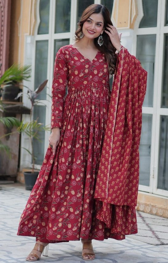 Magnetic Maroon Color Cotton Fabric Gown