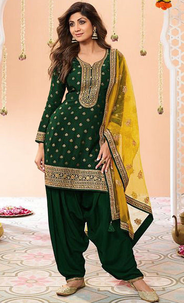 Tasteful Yellow Color Jacquard Fabric Patiala Suit