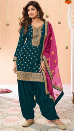 Tasteful Teal Color Jacquard Fabric Patiala Suit