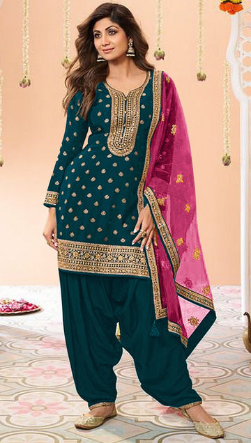 Tasteful Teal Color Jacquard Fabric Patiala Suit