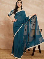 Amazing Teal Color Georgette Fabric Casual Saree