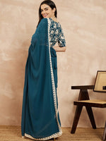 Amazing Teal Color Georgette Fabric Casual Saree