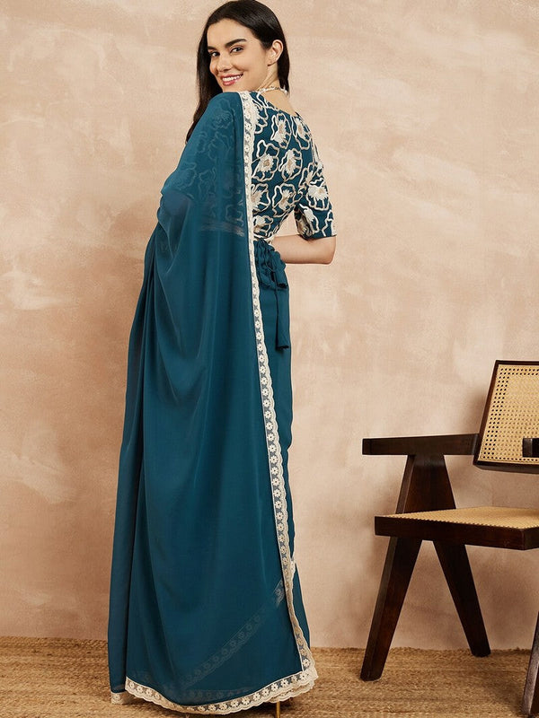 Amazing Teal Color Georgette Fabric Casual Saree